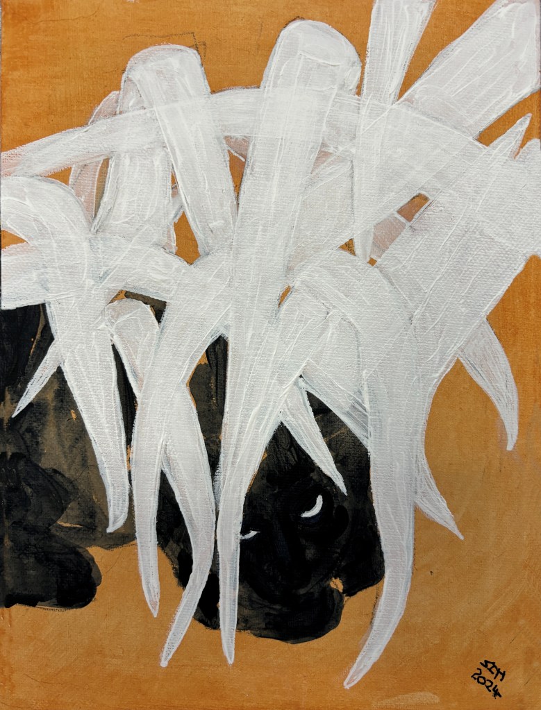 stylised cat in grass